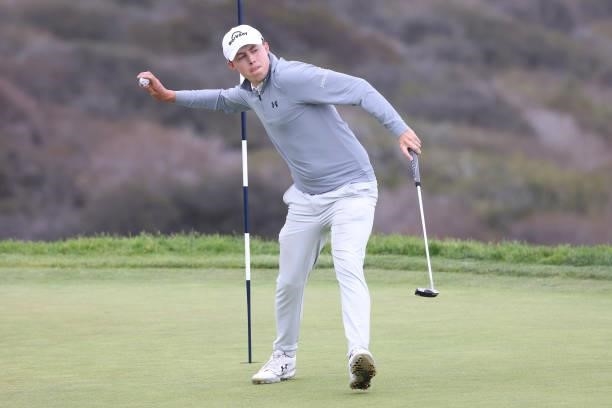 Matt Fitzpatrick of England tosses his golf ball in reaction to his bogey on the third green during the second round of the 2021 U.S. Open at Torrey...