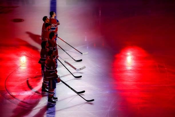 The Montreal Canadiens stand for the national anthem prior to Game Three of the Stanley Cup Semifinals of the 2021 Stanley Cup Playoffs against the...