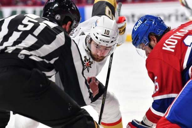 Nicolas Roy of the Vegas Golden Knights prepares for the face-off against Jesperi Kotkaniemi of the Montreal Canadiens during the first period in...
