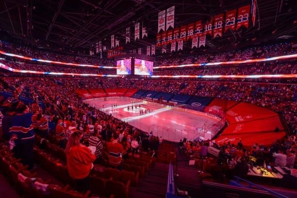 The Montreal Canadiens and Vegas Golden Knights stand for the national anthem prior to Game Three of the Stanley Cup Semifinals of the 2021 Stanley...