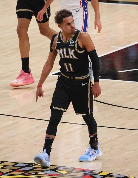 Trae Young of the Atlanta Hawks reacts after hitting a three-point basket against the Philadelphia 76ers during the first half of game 6 of the...