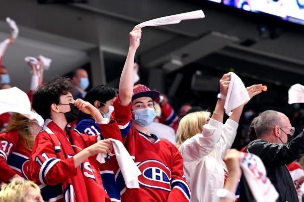 Montreal Canadiens fan cheers during the first period in Game Three of the Stanley Cup Semifinals of the 2021 Stanley Cup Playoffs against the Vegas...
