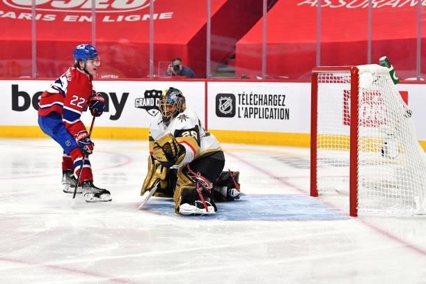 Cole Caufield of the Montreal Canadiens scores a goal past Marc-Andre Fleury of the Vegas Golden Knights during the second period in Game Three of...