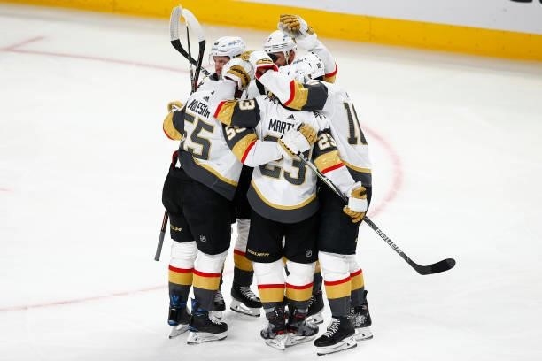 Nicolas Roy of the Vegas Golden Knights is congratulated by his teammates after scoring a goal against the Montreal Canadiens during the second...