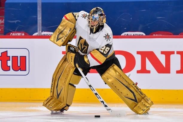 Marc-Andre Fleury of the Vegas Golden Knights clears the puck against the Montreal Canadiens during the second period in Game Three of the Stanley...