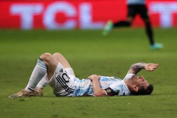 Lionel Messi of Argentina reacts after suffering and injury during a group A match between Argentina and Chile as part of Conmebol Copa America...