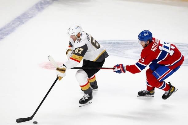 Max Pacioretty of the Vegas Golden Knights is pursued by Jesperi Kotkaniemi of the Montreal Canadiens during the second period in Game Three of the...