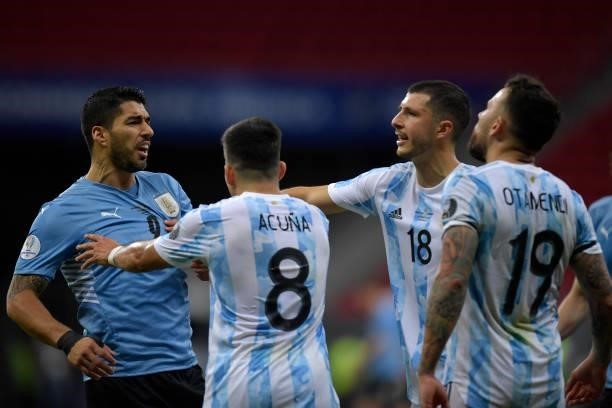 Luis Suarez of Uruguay argues with Nicolas Otamendi of Argentina during a group A match between Argentina and Chile as part of Conmebol Copa America...