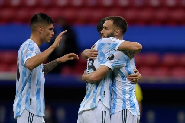 Guido Rodriguez of Argentina hugs teammate German Pezzella after group A match between Argentina and Chile as part of Conmebol Copa America Brazil...