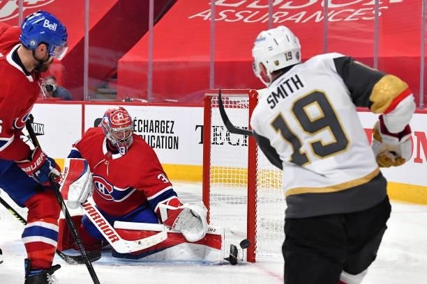 Reilly Smith of the Vegas Golden Knights attempts a shot on Carey Price of the Montreal Canadiens during the third period in Game Three of the...