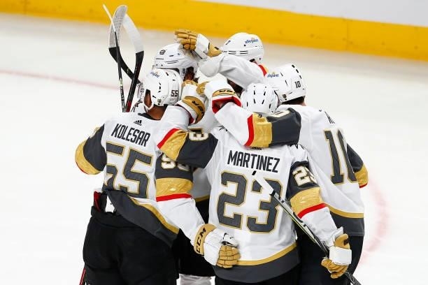 Nicolas Roy of the Vegas Golden Knights is congratulated by his teammates after scoring a goal against the Montreal Canadiens during the second...
