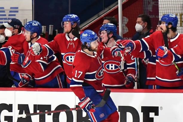 Josh Anderson of the Montreal Canadiens is congratulated by his teammates after scoring a goal against the Vegas Golden Knights during the third...