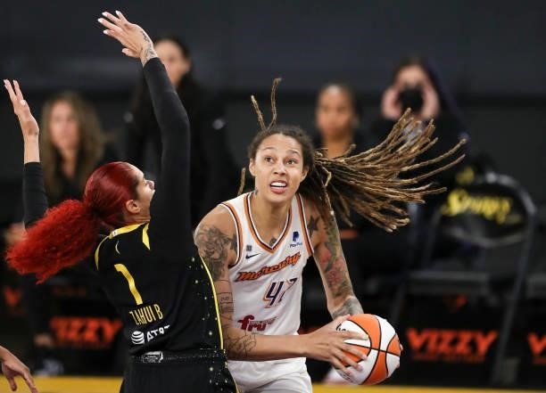Center Brittney Griner of the Phoenix Mercury looks to shoot defended by center Amanda Zahui B of the Los Angeles Sparks in the first half at Los...