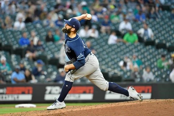 Andrew Kittredge of the Tampa Bay Rays pitches the ball during the game against the Seattle Mariners at T-Mobile Park on June 18, 2021 in Seattle,...