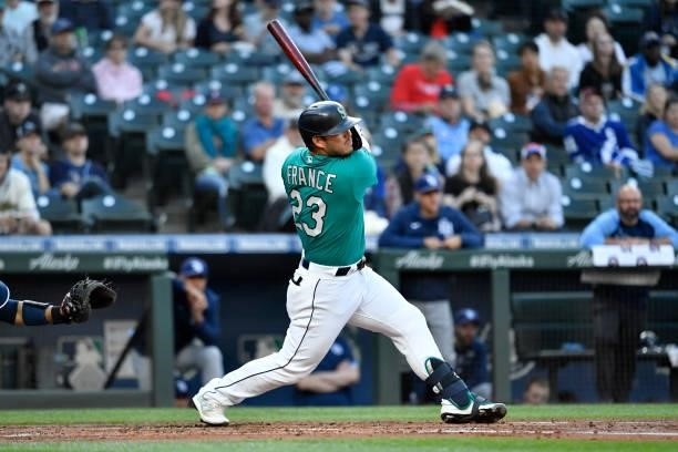Ty France of the Seattle Mariners hits the ball during the game against the Tampa Bay Rays at T-Mobile Park on June 18, 2021 in Seattle, Washington.