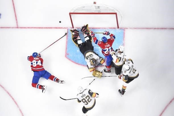 Corey Perry of the Montreal Canadiens attempts a shot on Marc-Andre Fleury of the Vegas Golden Knights during the second period in Game Three of the...