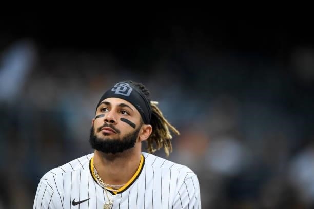Fernando Tatis Jr. #23 of the San Diego Padres looks on during the second inning of a baseball game against the Cincinnati Reds at Petco Park on June...