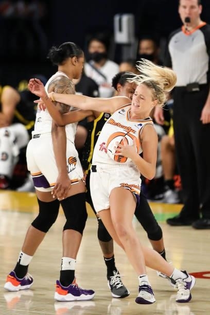 Guard Sophie Cunningham of the Phoenix Mercury handles the ball defended by guard Brittney Sykes of the Los Angeles Sparks in the second half at Los...