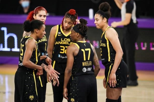 The Los Angeles Sparks talk after a foul call during the game against the Phoenix Mercury at Los Angeles Convention Center on June 18, 2021 in Los...