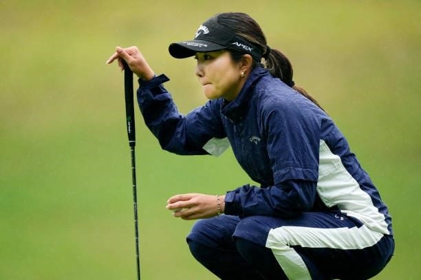 Riko Inoue of Japan lines up a putt on the 10th green during the second round of the Yupiteru Shizuoka Shimbun SBS Ladies at the Shizuoka Country...