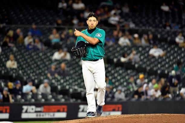 Yusei Kikuchi of the Seattle Mariners gives a thumbs-up during the game against the Tampa Bay Rays at T-Mobile Park on June 18, 2021 in Seattle,...