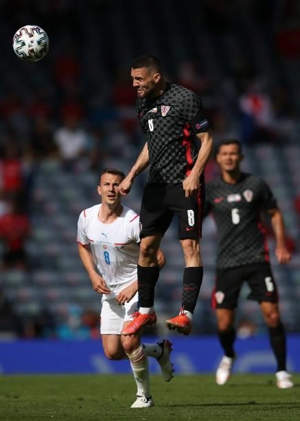 Mateo Kovacic of Croatia wins a header during the UEFA Euro 2020 Championship Group D match between Croatia and Czech Republic at Hampden Park on...