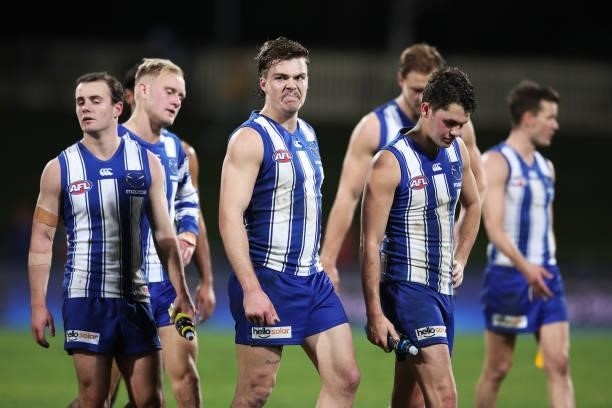 Cameron Zurhaar of the Kangaroos looks dejected after the round 14 AFL match between the North Melbourne Kangaroos and the Brisbane Lions at...