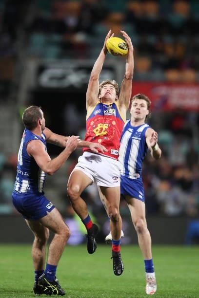 Deven Robertson of the Lions takes a mark during the round 14 AFL match between the North Melbourne Kangaroos and the Brisbane Lions at Blundstone...