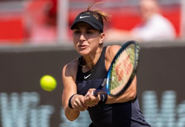 Belinda Bencic of Switzerland hits a backhand against Alize Cornet of France in the women's singles semifinal match during day 8 of the bett1open at...