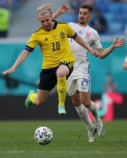 Emil Forsberg of Sweden competes for the ball with Martin Koscelnik of Slovakia during the UEFA Euro 2020 Championship Group E match between Sweden...