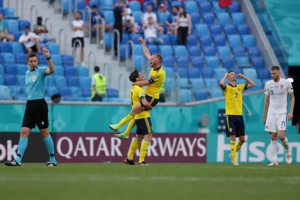 Sebastian Larsson and Gustav Svensson of Sweden celebrate after victory in the UEFA Euro 2020 Championship Group E match between Sweden and Slovakia...
