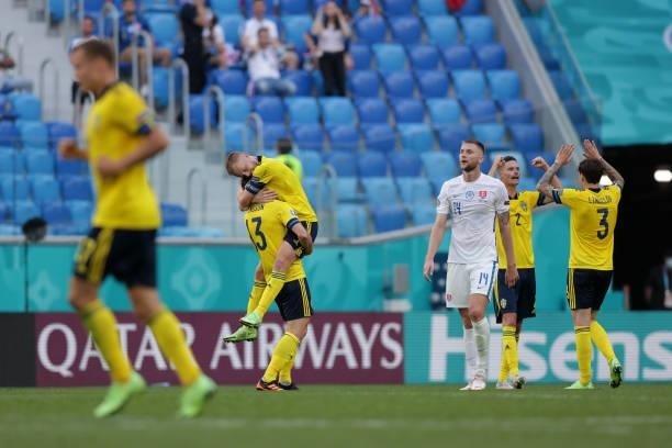 Sebastian Larsson and Gustav Svensson of Sweden celebrate after victory in the UEFA Euro 2020 Championship Group E match between Sweden and Slovakia...