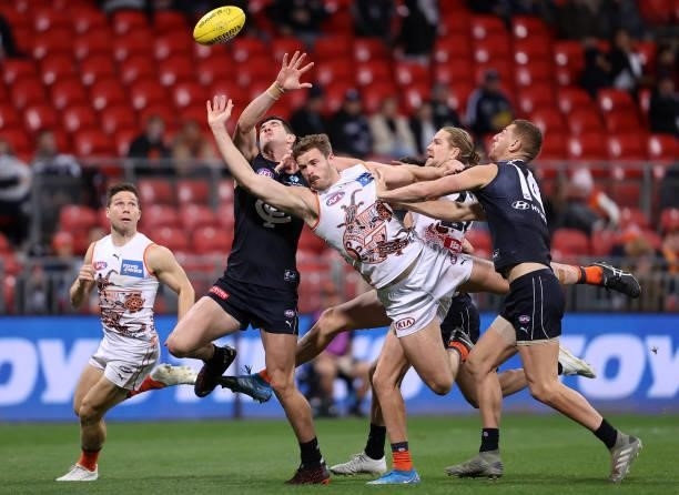 Kieren Briggs of the Giants attempts to mark during the round 14 AFL match between the Greater Western Sydney Giants and the Carlton Blues at GIANTS...