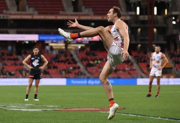 Jeremy Finlayson of the Giants kicks for goal during the round 14 AFL match between the Greater Western Sydney Giants and the Carlton Blues at GIANTS...