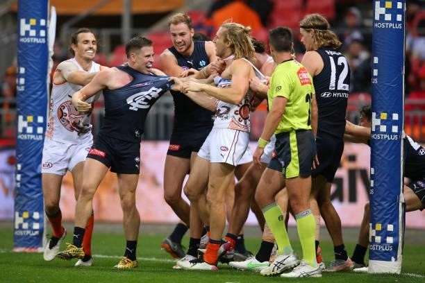 Matthew Owies of the Blues scuffles with Nick Haynes of the Giants during the round 14 AFL match between the Greater Western Sydney Giants and the...