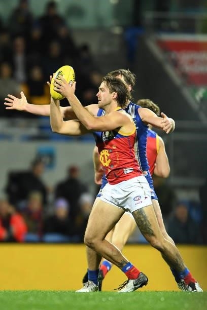 Rhys Mathieson of the Lions takes a mark during the round 14 AFL match between the North Melbourne Kangaroos and the Brisbane Lions at Blundstone...