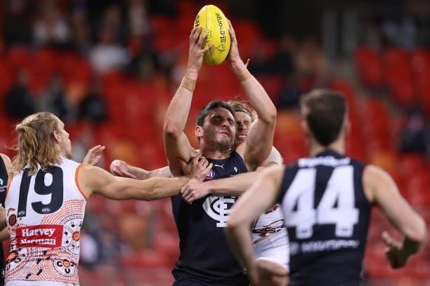Marc Pittonet of the Blues marks during the round 14 AFL match between the Greater Western Sydney Giants and the Carlton Blues at GIANTS Stadium on...