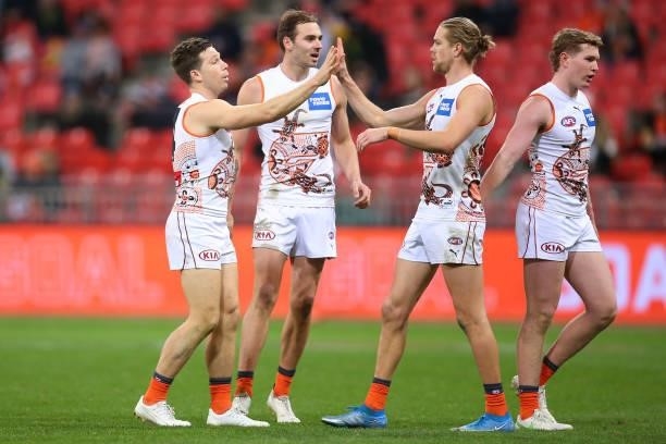Toby Greene of the Giants celebrates kicking a goal during the round 14 AFL match between the Greater Western Sydney Giants and the Carlton Blues at...