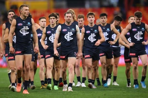 Sam Docherty of the Blues leads his team off the field after defeat during the round 14 AFL match between the Greater Western Sydney Giants and the...