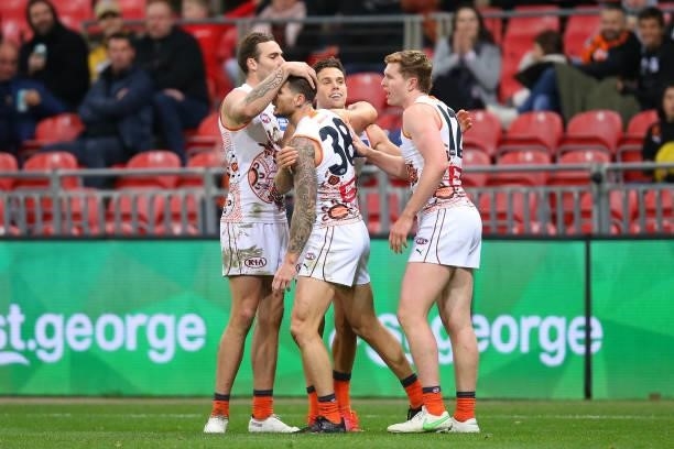 Josh Kelly of the Giants celebrates kicking a goal during the round 14 AFL match between the Greater Western Sydney Giants and the Carlton Blues at...
