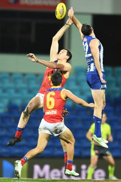 Oscar McInerney of the Lions competes in a ruck contest during the round 14 AFL match between the North Melbourne Kangaroos and the Brisbane Lions at...