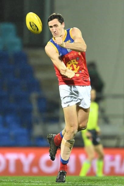 Oscar McInerney of the Lions handballs during the round 14 AFL match between the North Melbourne Kangaroos and the Brisbane Lions at Blundstone Arena...