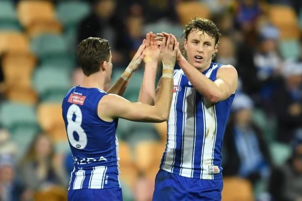 Nick Larkey of the Kangaroos celebrates a goal during the round 14 AFL match between the North Melbourne Kangaroos and the Brisbane Lions at...