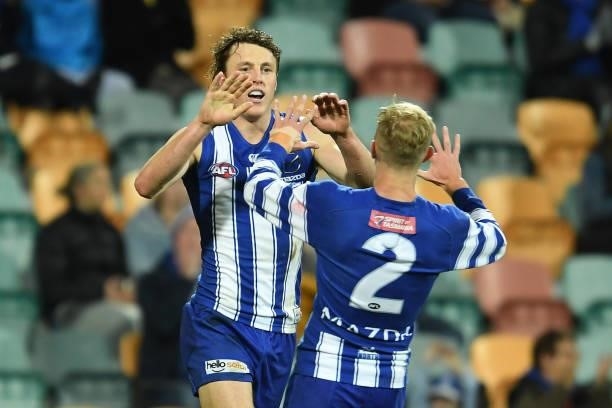 Nick Larkey of the Kangaroos celebrates a goal during the round 14 AFL match between the North Melbourne Kangaroos and the Brisbane Lions at...