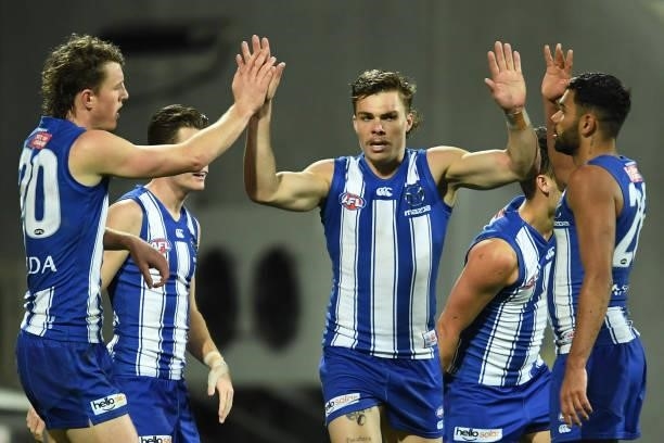 Cameron Zurhaar of the Kangaroos celebrates a goal during the round 14 AFL match between the North Melbourne Kangaroos and the Brisbane Lions at...