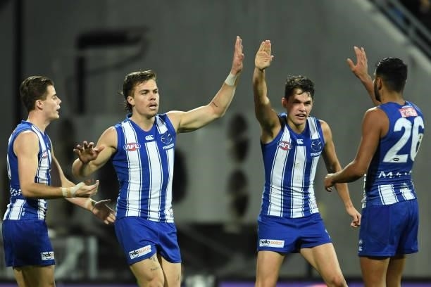 Cameron Zurhaar of the Kangaroos celebrates a goal during the round 14 AFL match between the North Melbourne Kangaroos and the Brisbane Lions at...