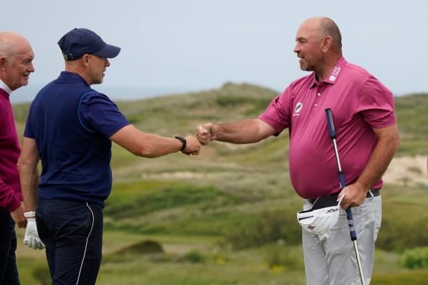 Thomas Bjorn of Denmark fist pumps Ryan Howsam, Group CEO Legends Tour during the second round of the Farmfoods Legends European Links Championship...