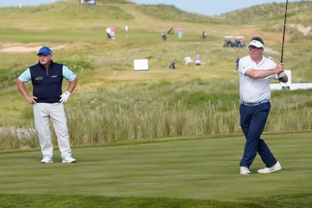 Ian Woonam of Wales watches his partner in action during the second round of the Farmfoods Legends European Links Championship hosted by Ian Woosnam...