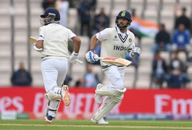 Virat Kohli and Ajinkya Rahane run during Day 2 of the ICC World Test Championship Final between India and New Zealand at the Hampshire Bowl on June...
