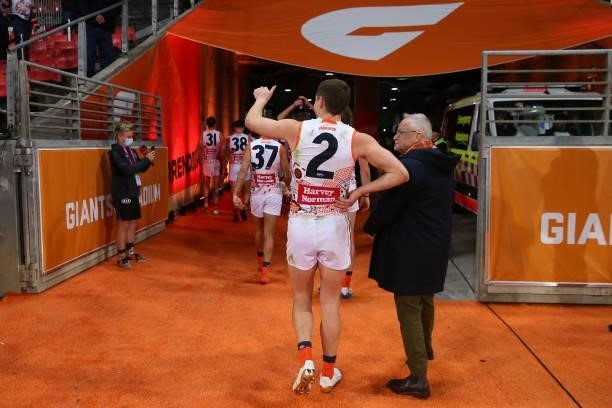 Jacob Hopper of the Giants acknowledges the crowd during the round 14 AFL match between the Greater Western Sydney Giants and the Carlton Blues at...